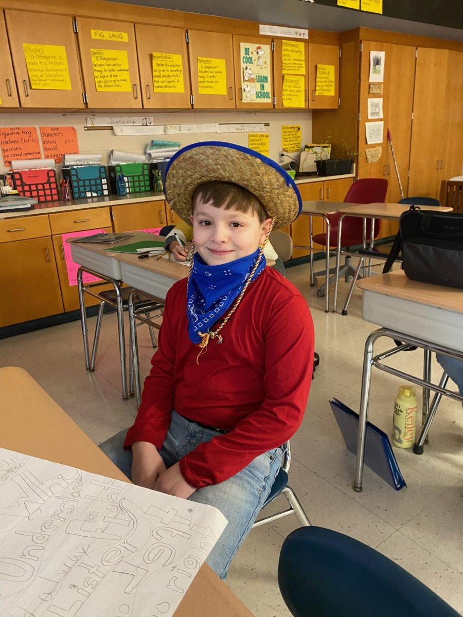 7th grader Gabe H. dressed up for Tuesday's Country vs. Country Club day! 